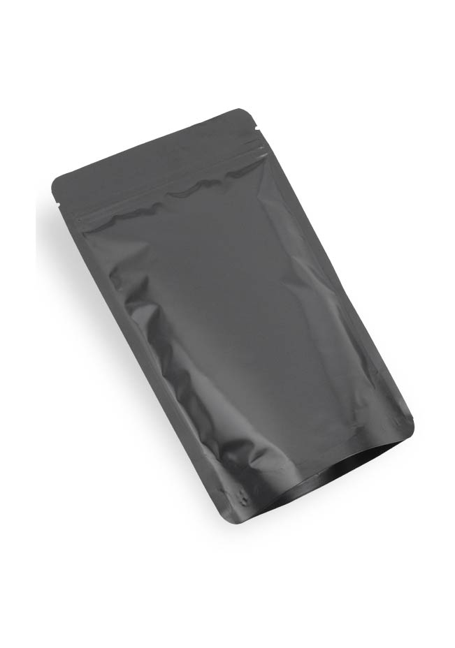 OTTO&ONE matte black aluminium stand-up pouch with zip, angled view