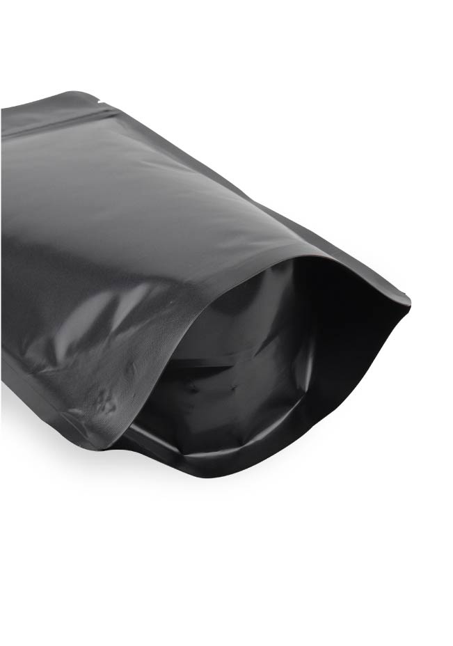 OTTO&ONE matte black aluminium stand-up pouch, expanded bottom gusset detail