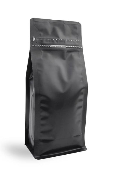 OTTO&ONE matte black flat-bottom pouch with zip – angled view