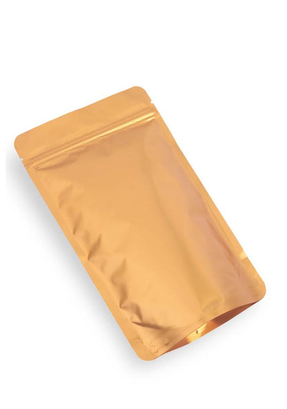 OTTO&ONE matte gold aluminium stand-up pouch with zip – angled view